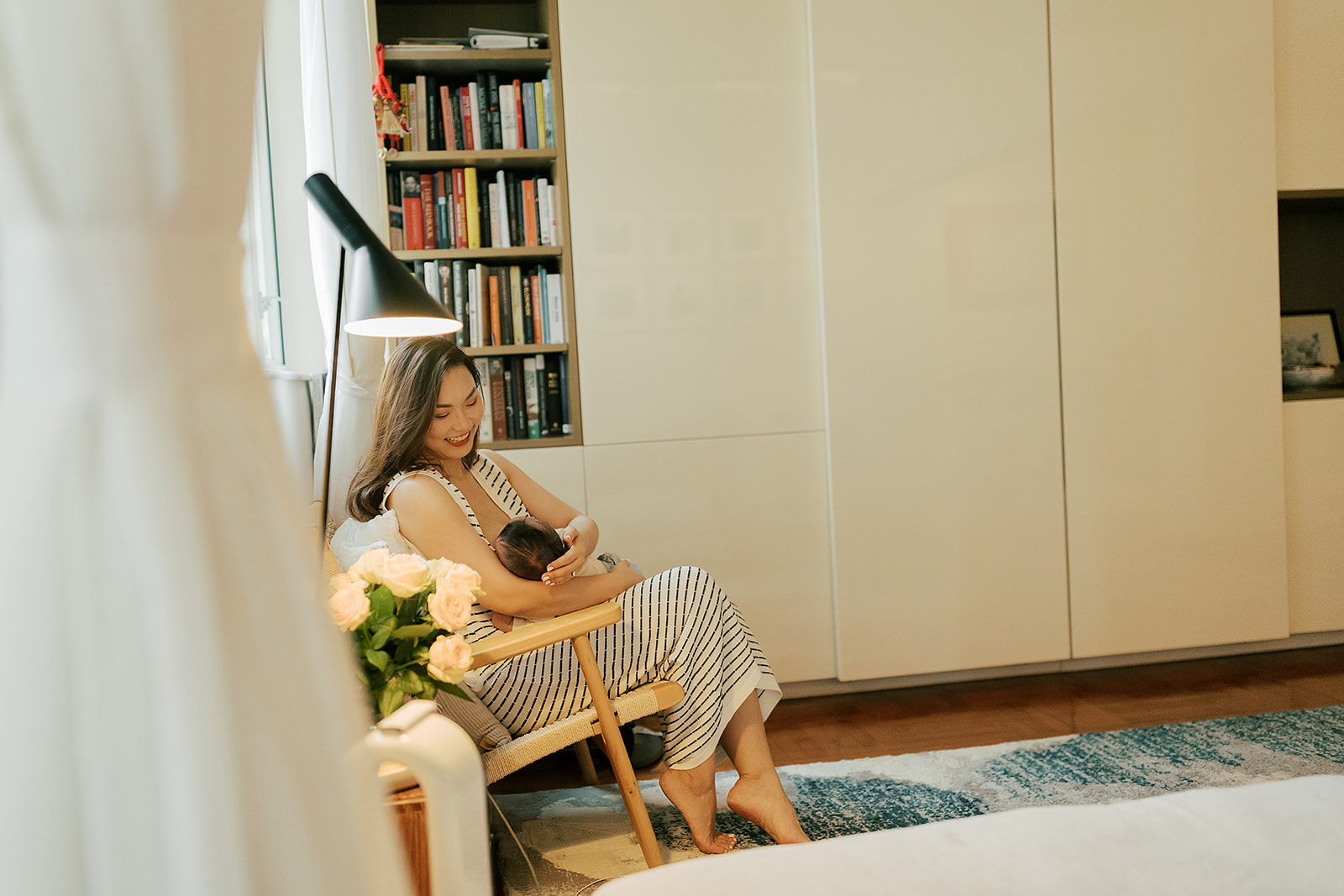 A wide shot of a living room filled with toys and books, representing a cozy family environment.