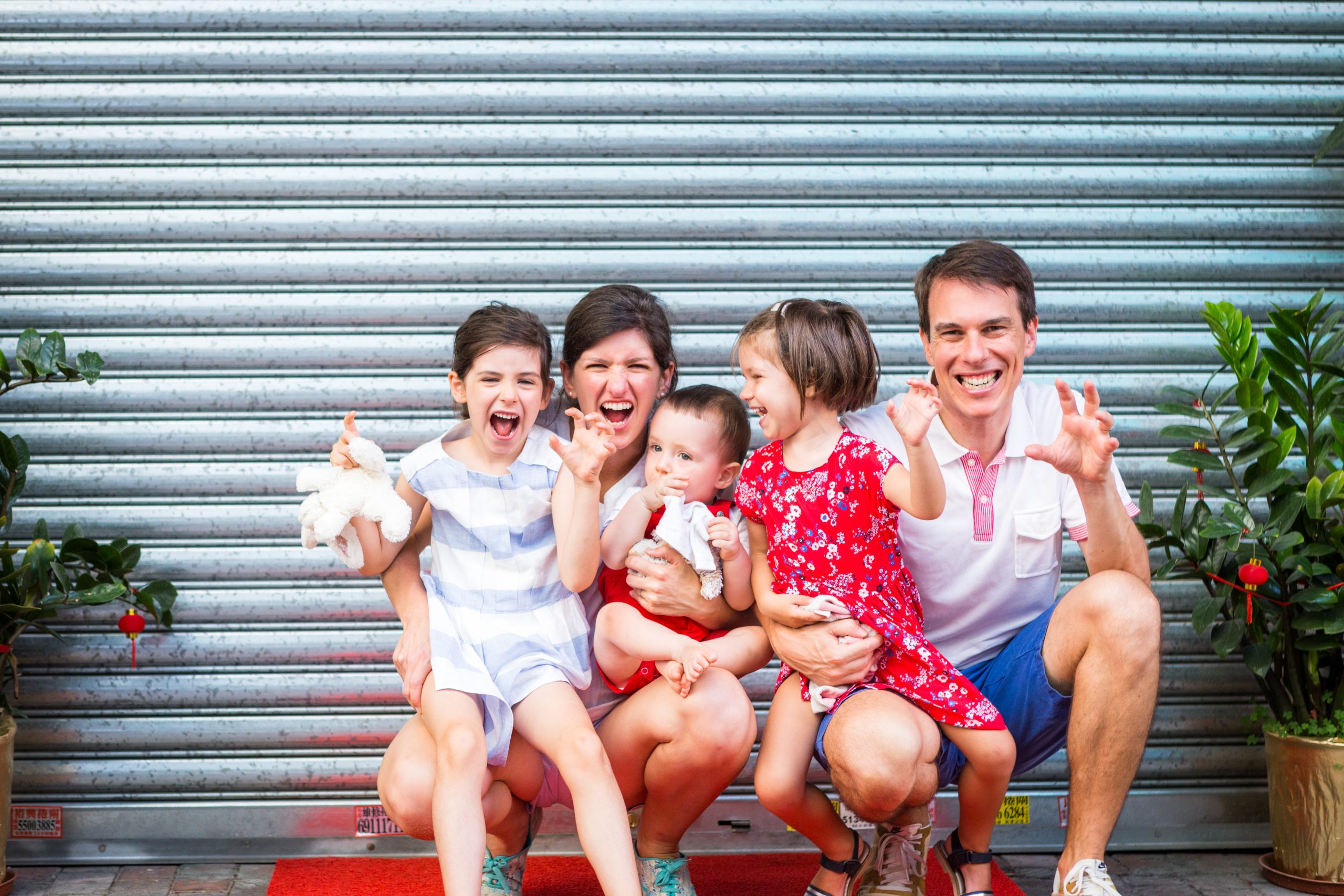 This family showing their best dinosaur smile